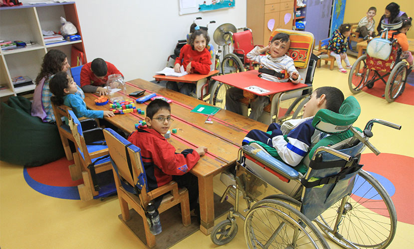 AKU student in Special Education at work, while fulfilling her course credits (Al-Kafaàt, 2012)